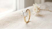 Oval lab grown diamond solitaire engagement ring in yellow gold